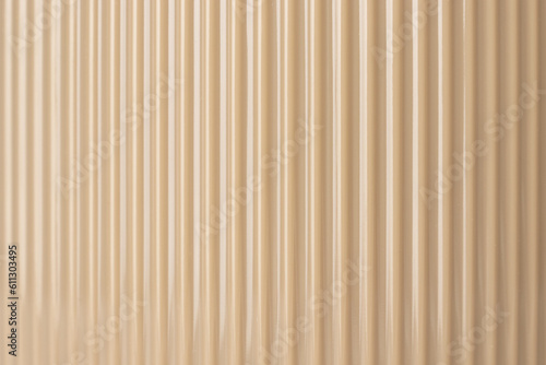 Striped tactile plastic surface of beige color