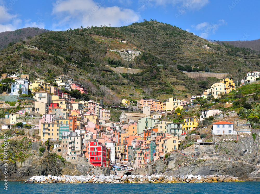 Colorful village in Cinque Terre national park, with a V shape, view from a boat