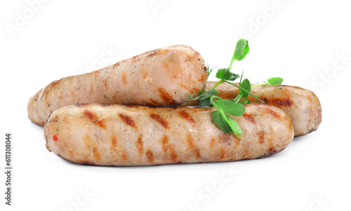 Tasty fresh grilled sausages with microgreens isolated on white