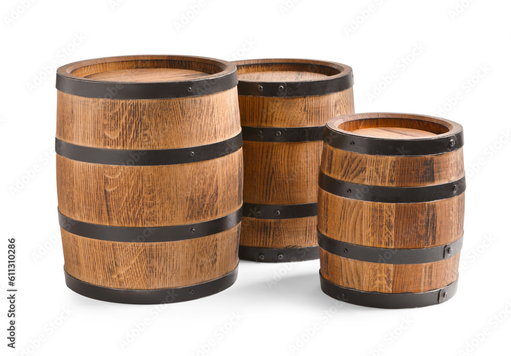 Three traditional wooden barrels on white background Three traditional wooden barrels on white background