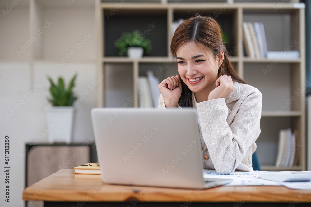 Business woman using calculator for do math finance on wooden desk in office and business working background, tax, accounting, statistics and analytic research concept... Business woman using calculator for do math finance on wooden desk in office and business working background, tax, accounting, statistics and analytic research concept...