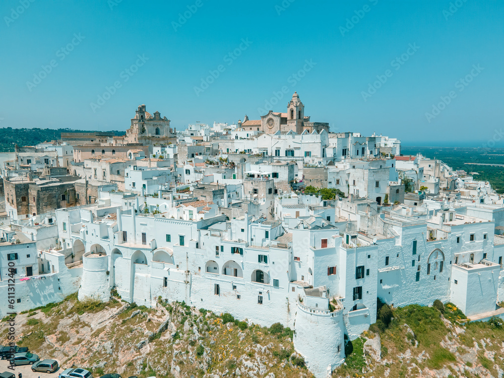 Panoramic view of the whole city of Ostuni in the Puglia region of Italy. White city drone view