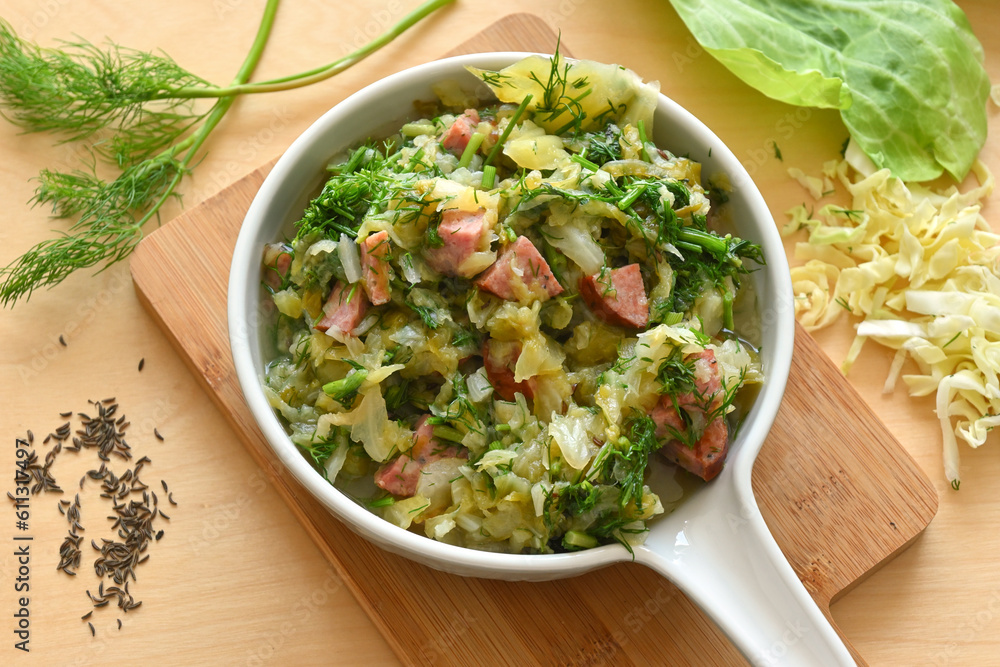 Stewed young cabbage with dill and sausage Stewed young cabbage with dill and sausage