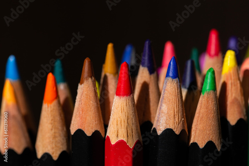 closeup macro shot of color pencils in a cup