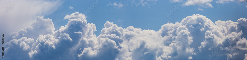 Sky panorama. Beautiful dramatic big clouds in the sky. Landscape of the power of heaven and nature. Copy space Sky panorama. Beautiful dramatic big clouds in the sky. Landscape of the power of heaven and nature. Copy space