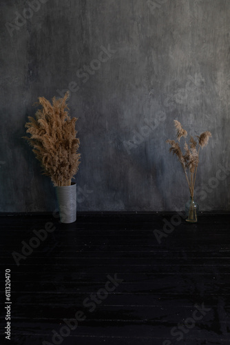 decorative flowers in a dark room on a gray background