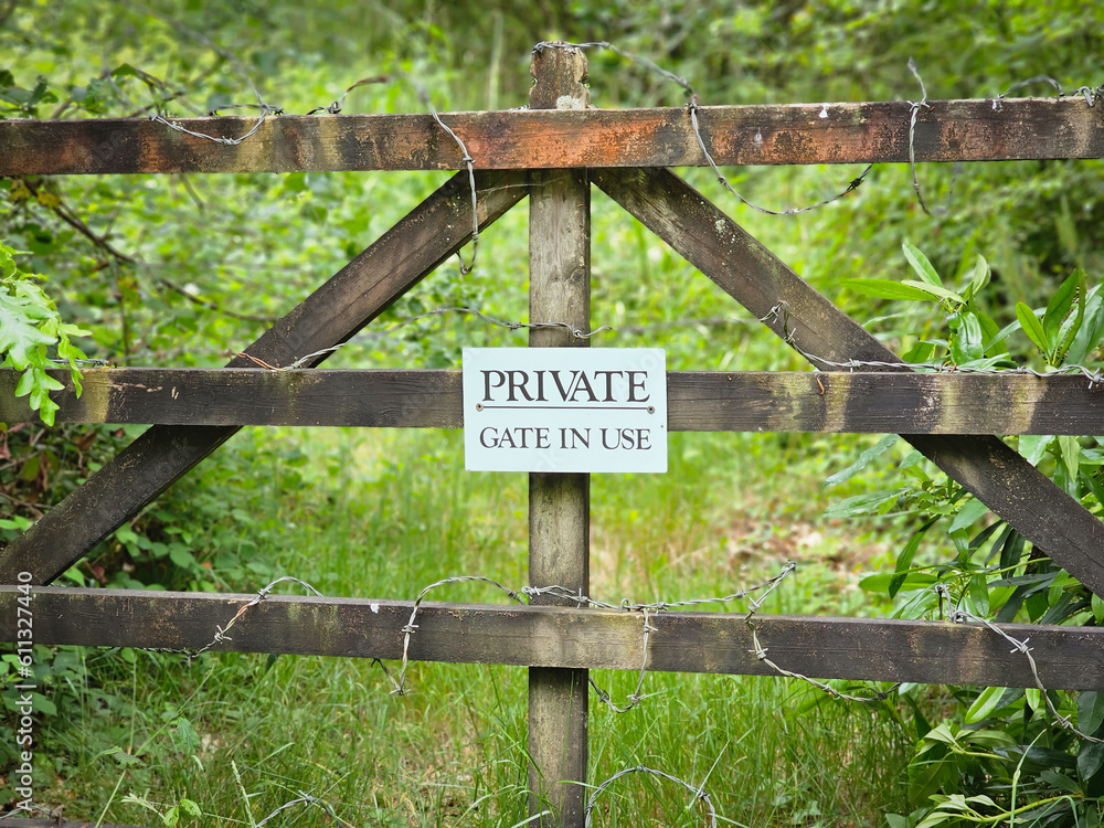private land gate sign in the countryside