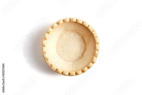Tartlet shell isolated on white background, top view. Single empty mini tart shell for portable desserts