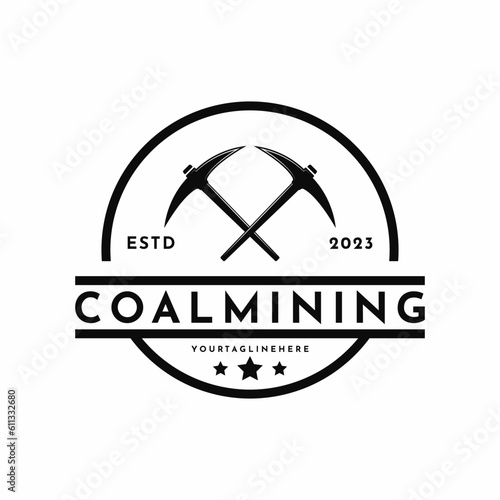 Vintage retro coal mining with symbol pickaxe logo design idea