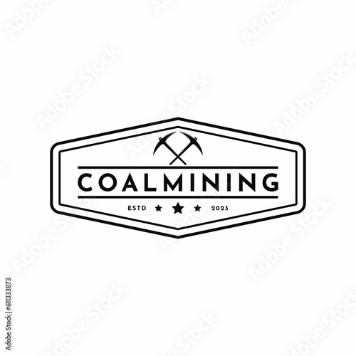 Vintage retro coal mining with symbol pickaxe logo design idea