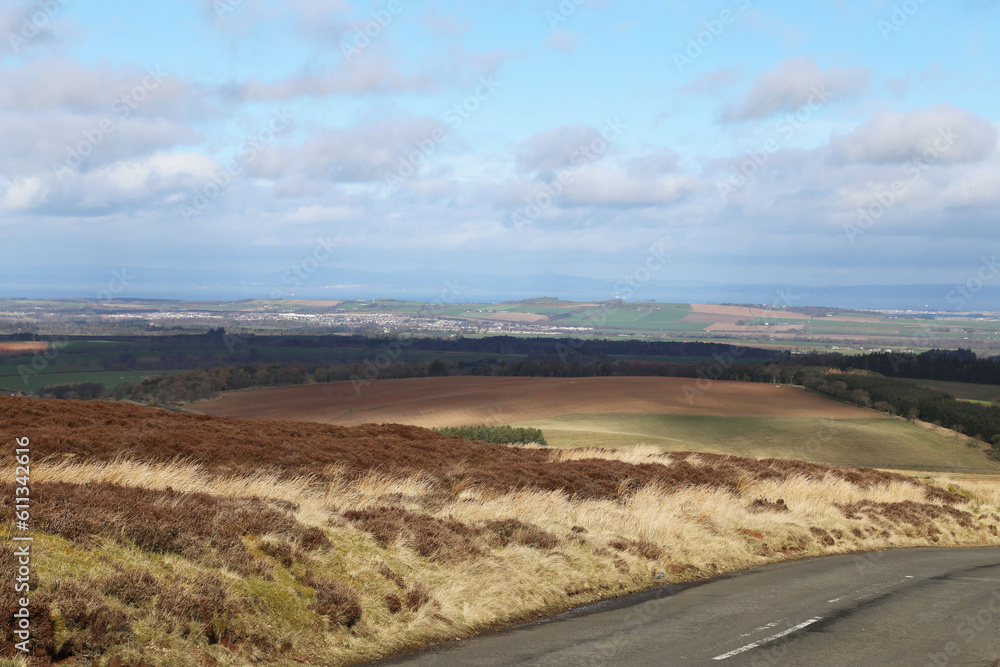 A view of the beautiful countryside and rolling hills of the Scottish Borders in southern Scotland, UK.