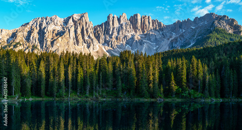 Captivating summer view of Carezza  Karersee  lake. Spectacular morning scene of Dolomiti Alps  Province of Bolzano  South Tyrol  Italy  Europe. Beauty of nature concept background.