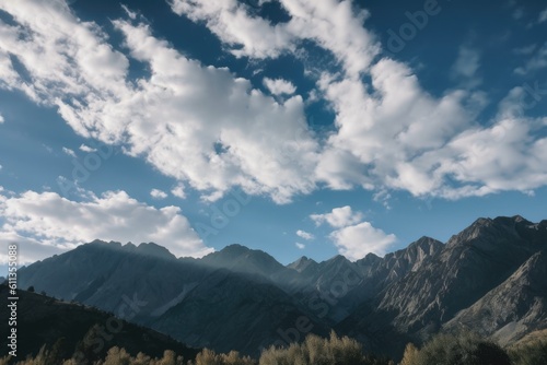 sky and clouds overhead, with mountain peaks in the background, created with generative ai