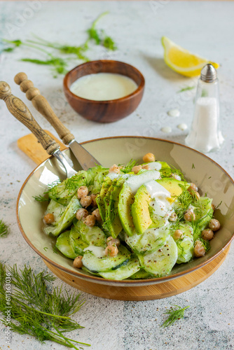 Cucumber salad with chickpeas and avocado