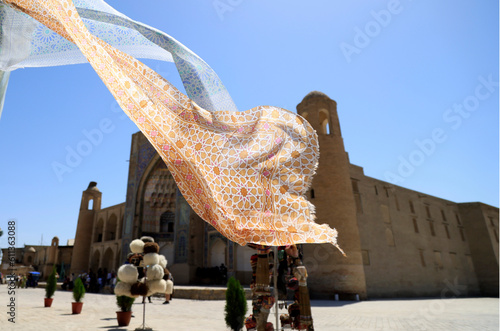 Silk drapes blowing in the wind in the historic center of Bukhara, Uzbekistan