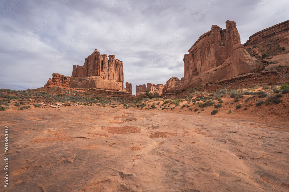 hiking the park avenue trail in arches national park, utah, usa hiking the park avenue trail in arches national park, utah, usa