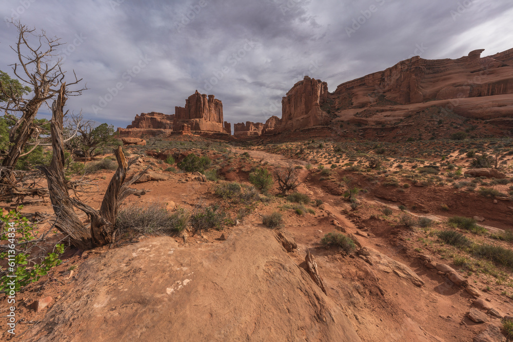 hiking the park avenue trail in arches national park, utah, usa hiking the park avenue trail in arches national park, utah, usa