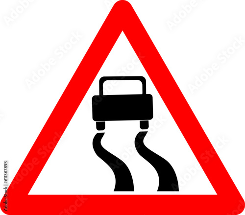 Sign slippery road. Warning sign slippery road. Red triangle sign with car skidding inside. Caution wet, snowy, icy road. Skid risk.