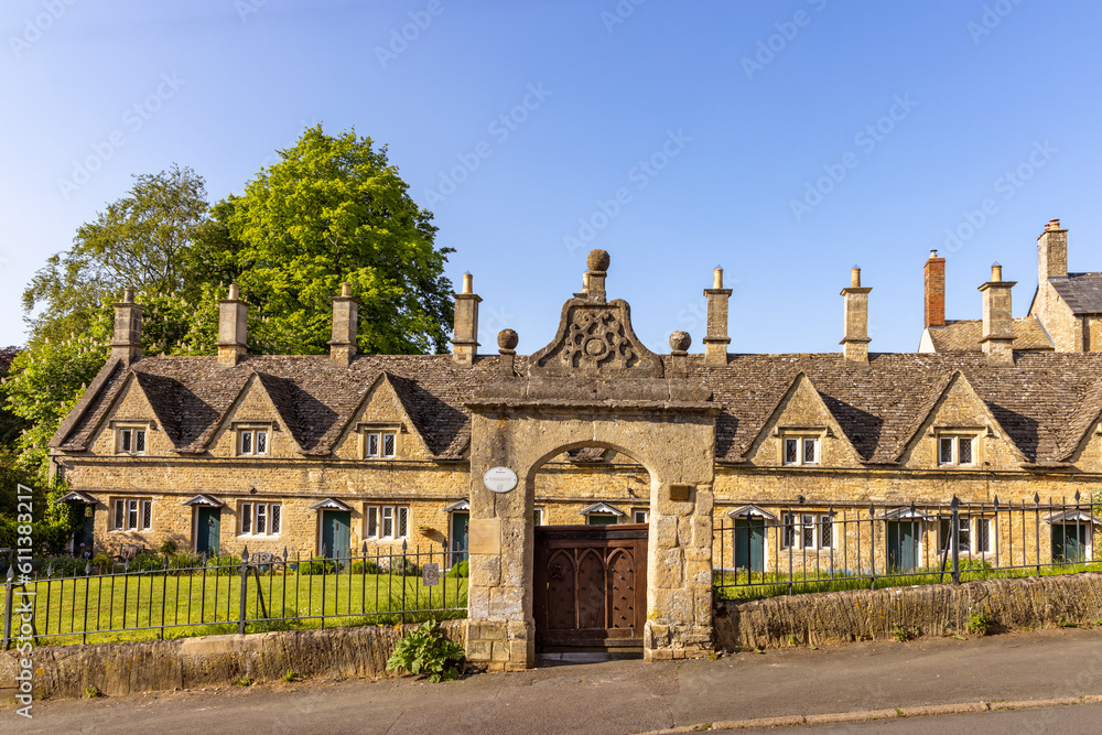 The gabled almshouses in Church Street, Chipping Norton, Cotswolds, England were built by Henry Cornish in 1640. The gabled almshouses in Church Street, Chipping Norton, Cotswolds, England were built by Henry Cornish in 1640.