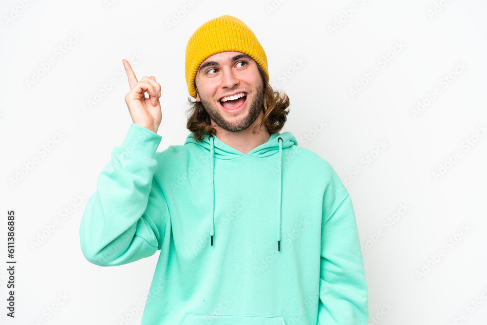 Young handsome man isolated on white chroma background intending to realizes the solution while lifting a finger up Young handsome man isolated on white chroma background intending to realizes the solution while lifting a finger up