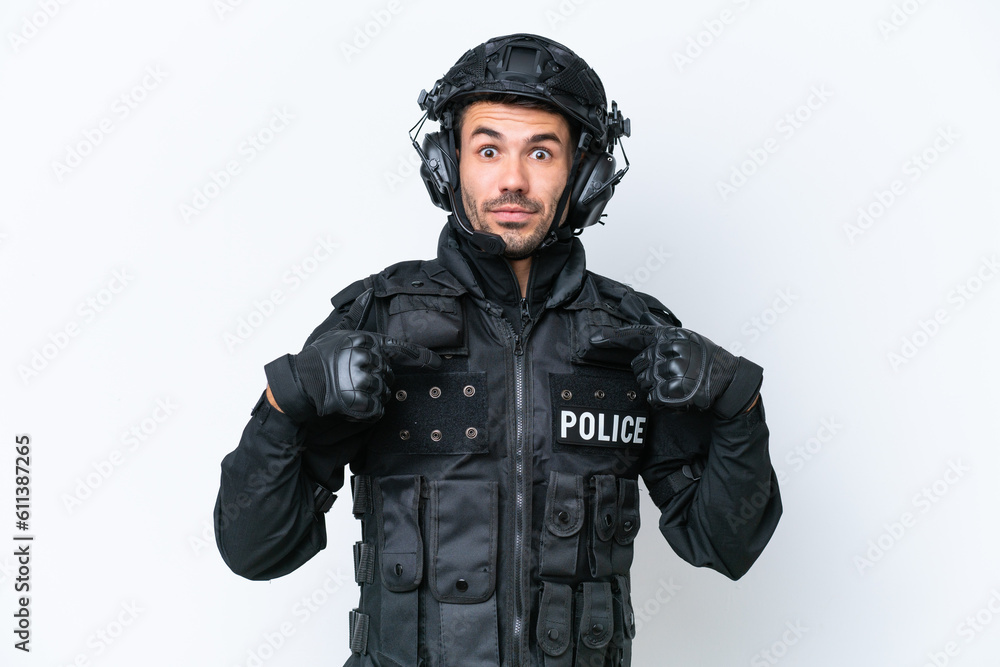 Young caucasian SWAT man isolated on white background proud and self-satisfied Young caucasian SWAT man isolated on white background proud and self-satisfied