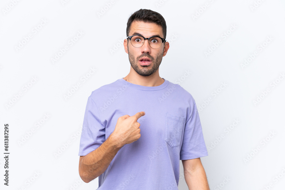 Young caucasian man isolated on white background pointing to oneself Young caucasian man isolated on white background pointing to oneself