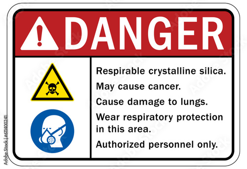 Wear respiratory equipment sign and labels possible crystalline silica. May cause cancer. Cause damage to lungs. Wear respiratory protection in this area