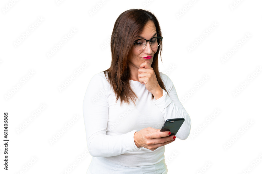 Middle age woman over isolated chroma key background thinking and sending a message Middle age woman over isolated chroma key background thinking and sending a message