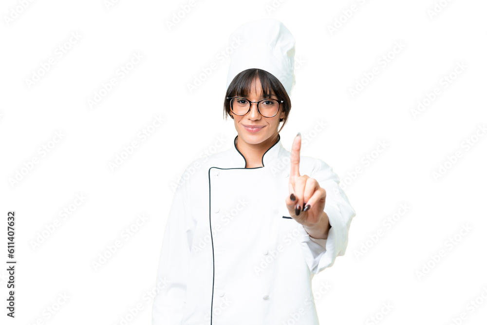 Young caucasian chef woman over isolated chroma key background showing and lifting a finger Young caucasian chef woman over isolated chroma key background showing and lifting a finger
