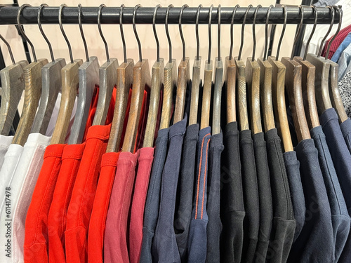 T-shirts hanging on a hanger. Style and wardrobe for men. Shopping.