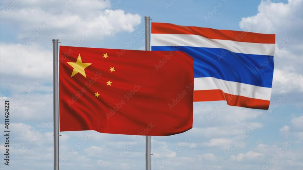 Kingdom of Thailand and China flag waving together in the wind on blue sky, cycle looped video, two country cooperation concept Kingdom of Thailand and China flag waving together in the wind on blue sky, cycle looped video, two country cooperation concept