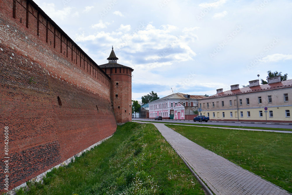 Kolomna, Russia - May 30, 2023: Street with a fortress wall in Kolomna city. Ancient Russian architecture