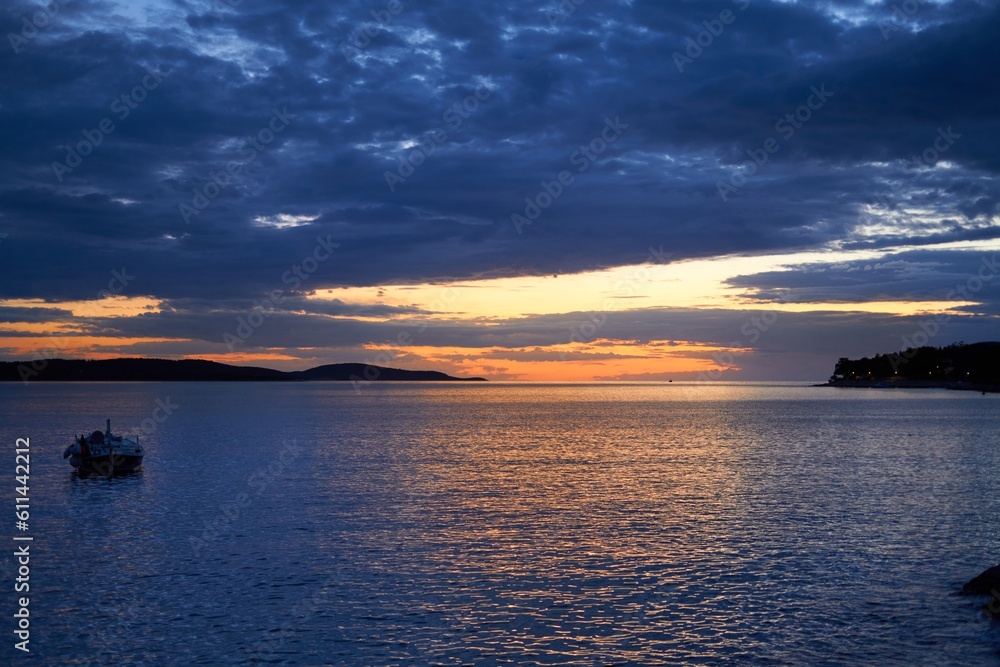 Seascape at sunset - small port in Croatia, Adriatic sea, Dalmatia, Europe.