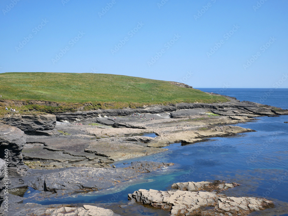 Cliffs and hills at the Atlantic ocean, rocks canyon, beauty in nature. Vacation travel to Ireland background Cliffs and hills at the Atlantic ocean, rocks canyon, beauty in nature. Vacation travel to Ireland background