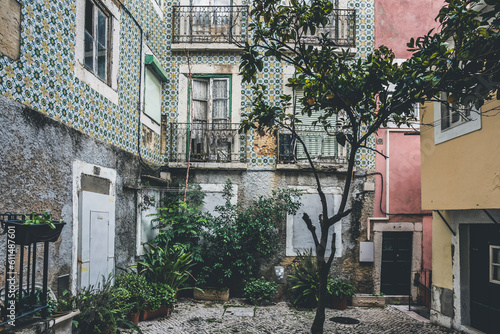 Classic old apartment building with balconies and shutters in Lisbon, Portugal photo