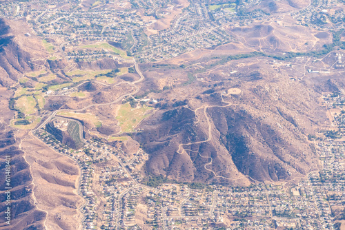 Aerial view of the Norco Ridge in Norco, California featuring Pumpkin Rock, The Hidden Valley Golf Club and the Norco Ridge Ranch, and Mount Two Bits © John McAdorey