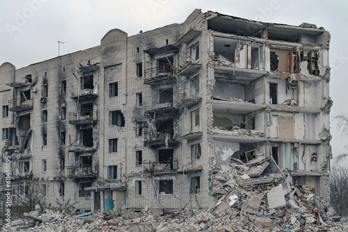 An exterior view of a high-rise residential building heavily damaged by after the bombing in Izium (Izyum)