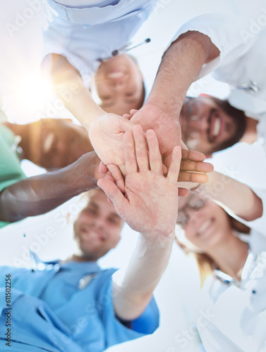 Professional Doctors Holding Each Other Hands. Multinational Medician Meeting. Teamwork Connection. Clinician Team Group. Working Together.