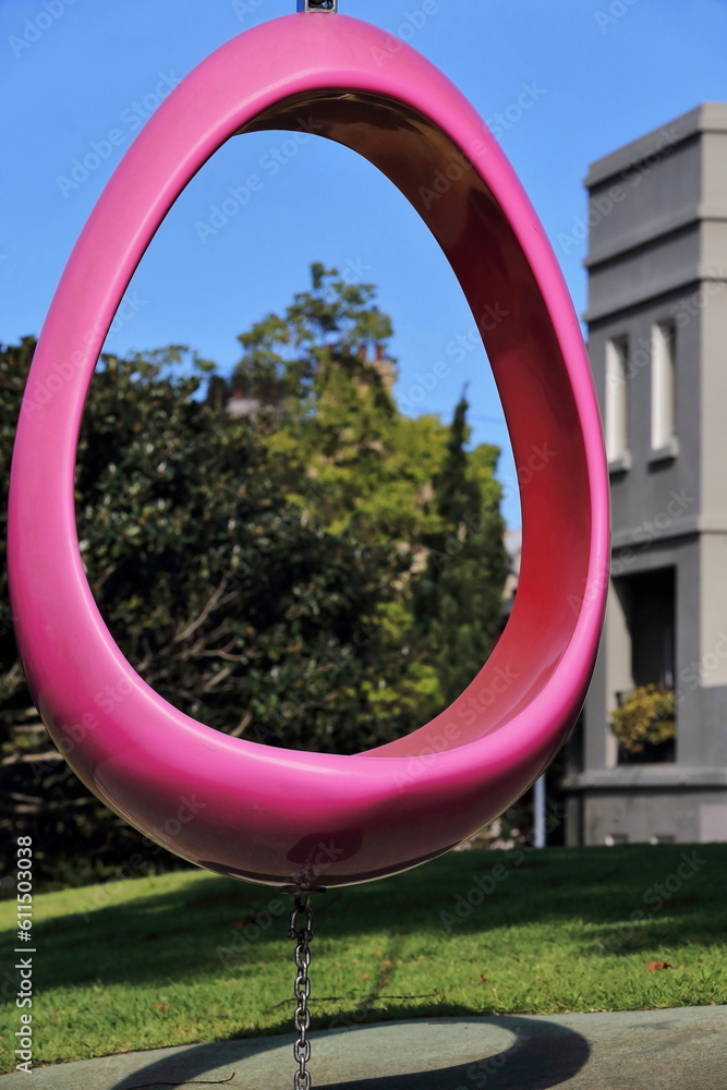 Pink-red egg swing on the Royal Hospital for Women Park, Paddington suburb. Sydney-Australia-685