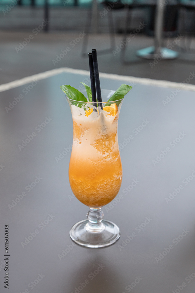 orange cocktail in rooftop bar
orange cocktail in rooftop bar