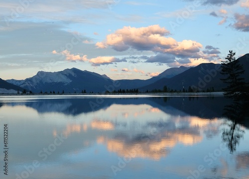 Peaceful mountain lake with reflections in sunset. Kananaskis lake near Canmore. Canadian Rockies. Alberta. Canada