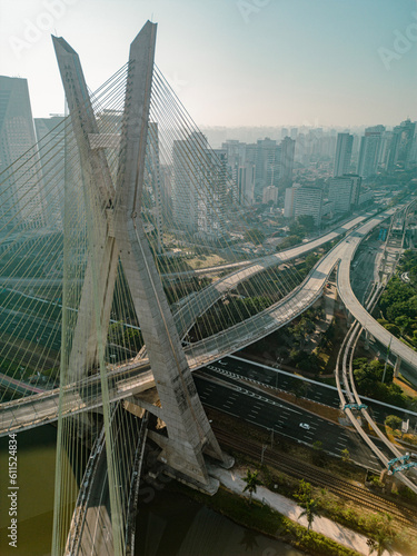 2023 view of the Pinheiros river with modern buildings beside it and the famous Octavio Frias de Oliveira bridge in the city of São Paulo. © Paulo
