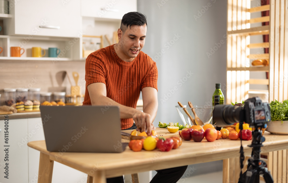 A male social media influencer creates videos, shares instructions for making fruit salad online, expands his subscriber and advertising-generating audience. Start-up options for new small businesses A male social media influencer creates videos, shares instructions for making fruit salad online, expands his subscriber and advertising-generating audience. Start-up options for new small businesses