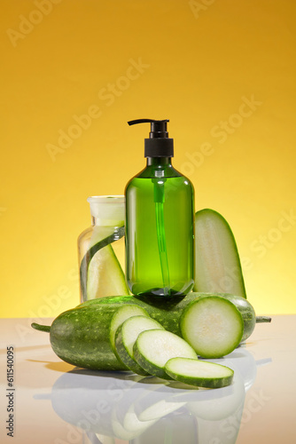 Mockup scene for advertising product with winter melon ingredient. A green pump bottle unlabeled placed on a fresh winter melon decorated on a yellow background. Space for design