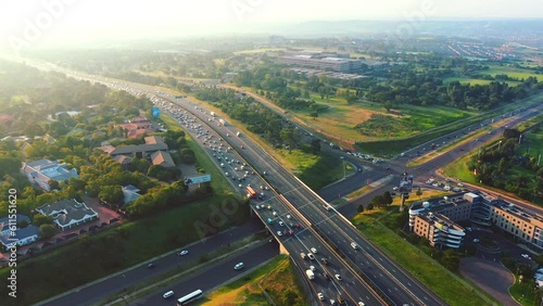 Highway, city drone and road with cars and urban development with street and transport. Traffic, Brazil background and transportation with roads and skyline with car travel and outdoor cityscape