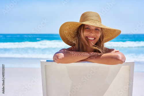 Portrait, beach and woman on a holiday, summer and travel with happiness, relax and getaway with tourism. Face, female person or girl on a chair, seaside vacation and tropical island with destination
