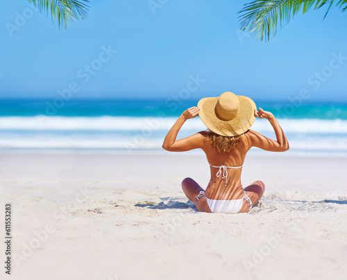 Travel, beach and woman on island for holiday, tropical adventure and vacation in Mauritius. Tropical mockup, ocean and back of female person relax in bikini by sea for tourism, summer and getaway