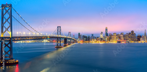 Cityscape view of San Francisco and the Bay Bridge with Colorful Sunset from island © anekoho