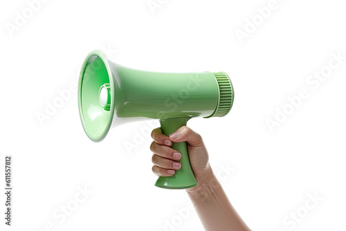 The hand holds a green megaphone on a white background. Announcement concept. Shout It Out