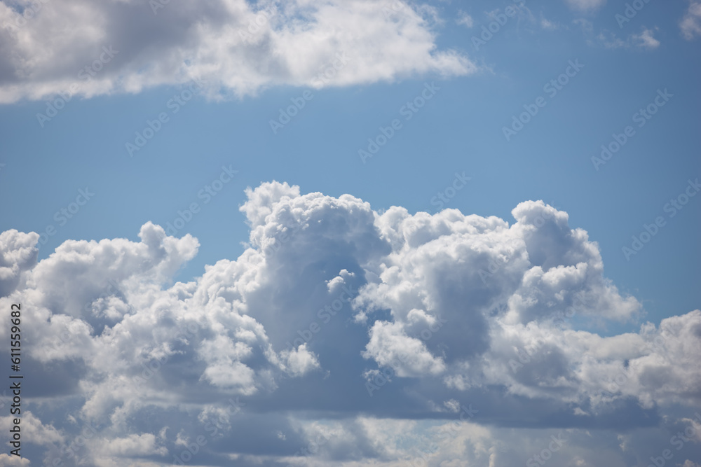 Nature, space and sunshine with clouds in blue sky for heaven, peace and climate. Environment, mockup and dream with fluffy cloudscape in ozone air for freedom, pattern and weather meteorology Nature, space and sunshine with clouds in blue sky for heaven, peace and climate. Environment, mockup and dream with fluffy cloudscape in ozone air for freedom, pattern and weather meteorology